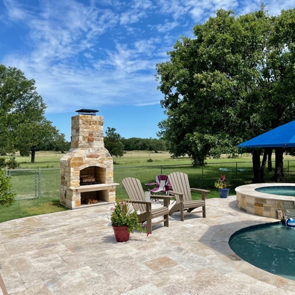 Outdoor Fireplace with Pool Patio