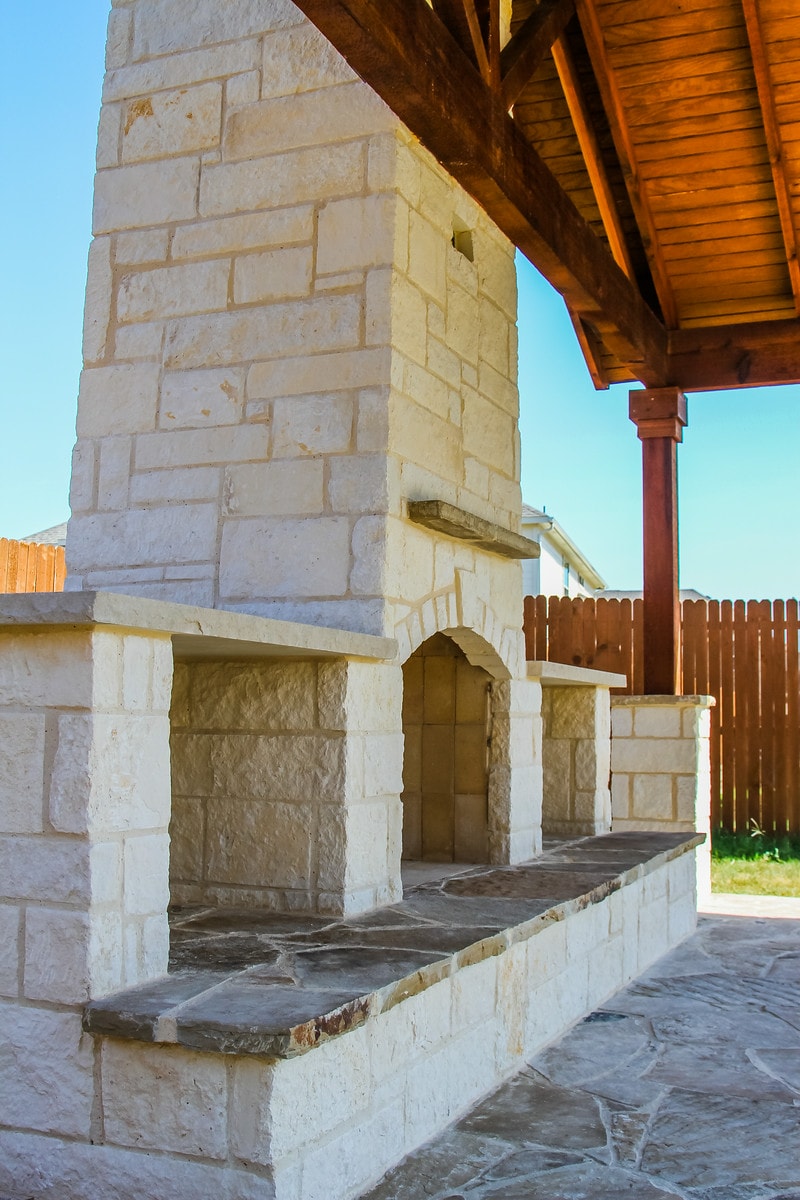 Stone Fireplace Under Patio Cover
