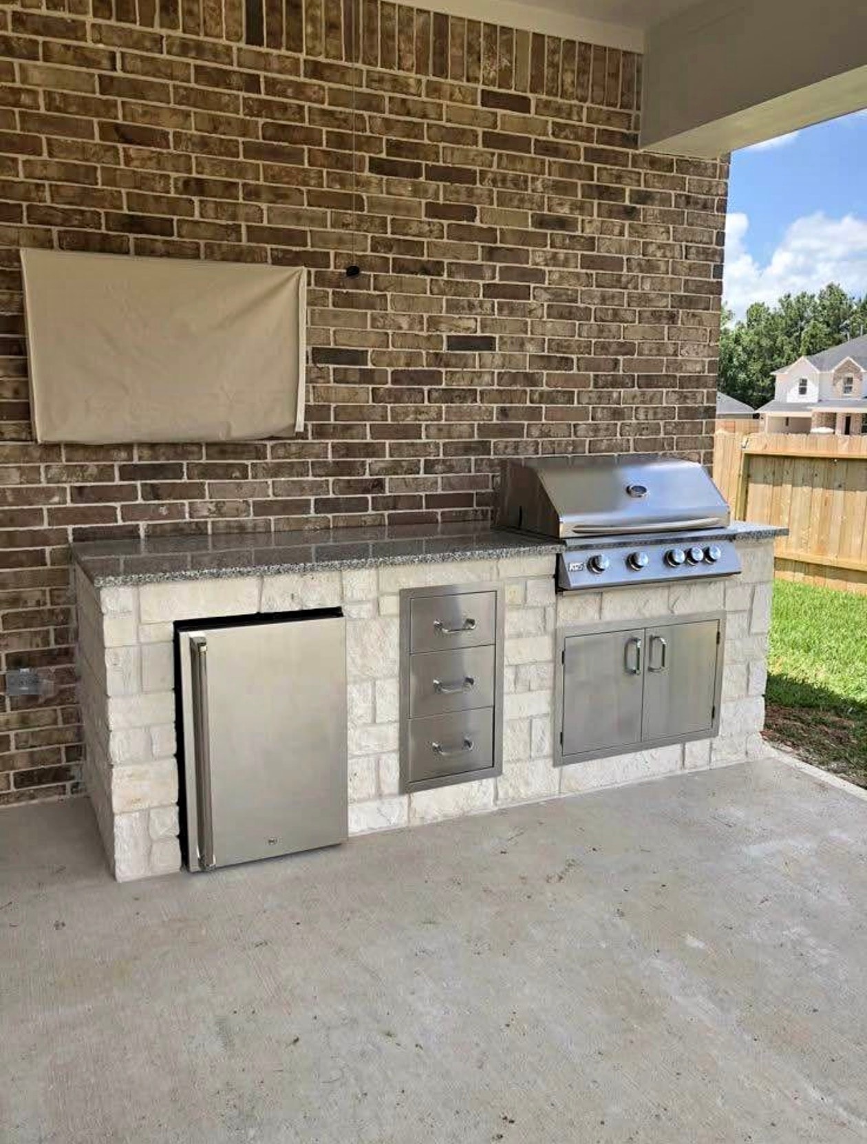 Stone Kitchen with Fridge & Grill