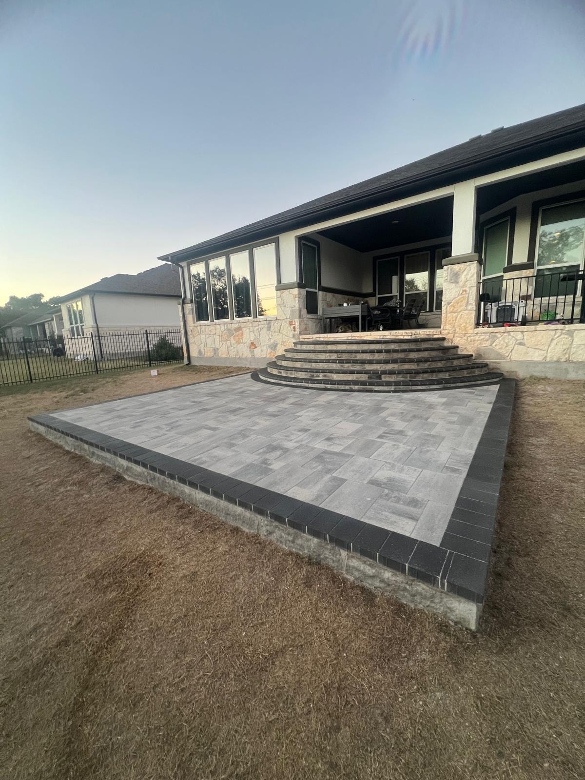 Modern Home with Paved Patio